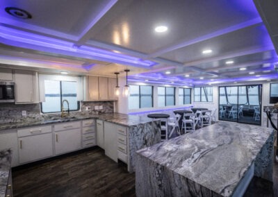 Interior buffet setup area on The Stardust luxury houseboat used for food and beverage service on Lake Lanier