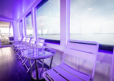 Top mid deck bar and DJ booth on The Stardust luxury houseboat during a private cruise on Lake Lanier