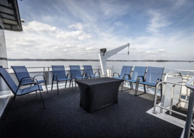 Top back deck seating area on The Stardust luxury houseboat overlooking Lake Lanier near Lanier Islands