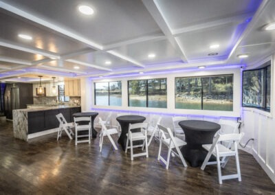 Spacious downstairs interior lounge on The Stardust luxury houseboat near Lanier Islands Georgia