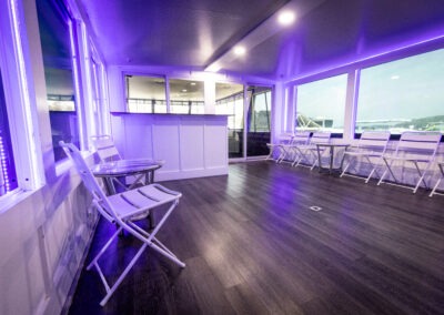 DJ booth and bar on the mid deck of The Stardust luxury houseboat near Lanier Islands Georgia