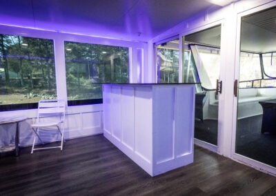 Top mid deck dance and bar area on The Stardust luxury houseboat during a Lake Lanier cruise