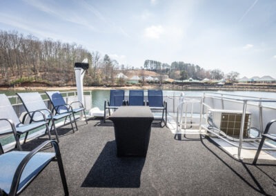Top back deck on The Stardust luxury houseboat overlooking the water of Lake Lanier