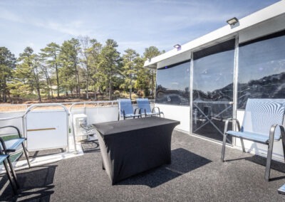 Top back deck gathering area on The Stardust luxury houseboat near Lanier Islands on Lake Lanier