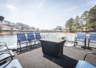 Top back deck on The Stardust luxury houseboat with panoramic lake views on Lake Lanier