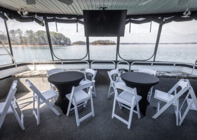 Lower party deck on the Fantasy luxury houseboat for private cruise celebrations near Lanier Islands