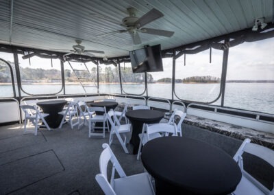 Fantasy luxury houseboat cruising on Lake Lanier near Lanier Islands available for private cruise experiences